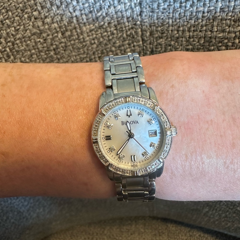 Bulova women’s MoP dial crystal bezel/accent day date running watch